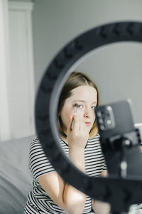 Make up influencer vlogging at home