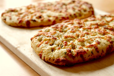 Close-up of pizza on cutting board