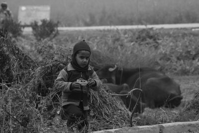 Boy playing with toy car