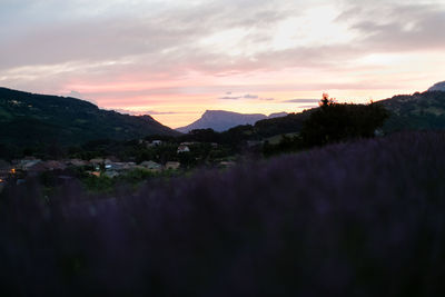 Scenic view of mountains against sky during sunset