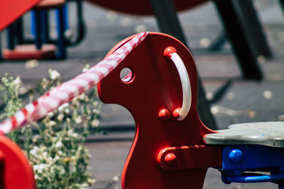 Close-up of red fire hydrant in city