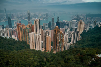 Panoramic view of buildings in city against sky