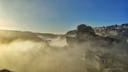 Panoramic view of buildings against clear sky