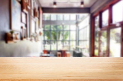 Close-up of table by window