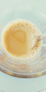 High angle view of coffee in cup on table