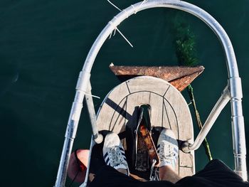 High angle view of man sitting on boat