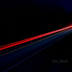 Light trails on road at night