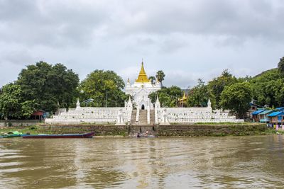 A limestone pagoda against cloud-sky