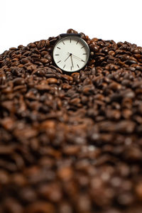 Low angle view of clock over white background