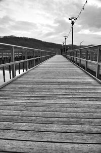 Footbridge against sky