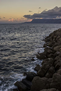 Scenic view of sea against sky during sunset