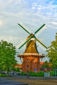 Traditional windmill against sky