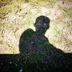 Shadow of people on grass