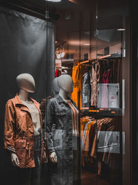 Rear view of man standing in store