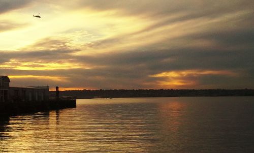 Scenic view of sea at sunset