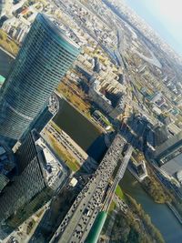 High angle view of river amidst buildings in city