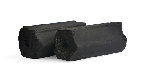 Close-up of stone against white background