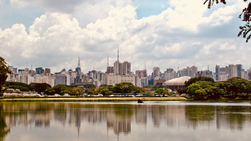 City by buildings against sky