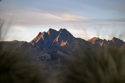 Rocky mountain ridge and alpine landscape, at sunset in new zealand
