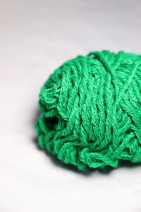 Close-up of green leaf on table