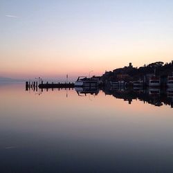 Reflection of sky in water at sunset