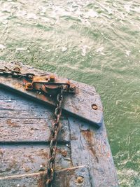 High angle view of old boat moored on sea