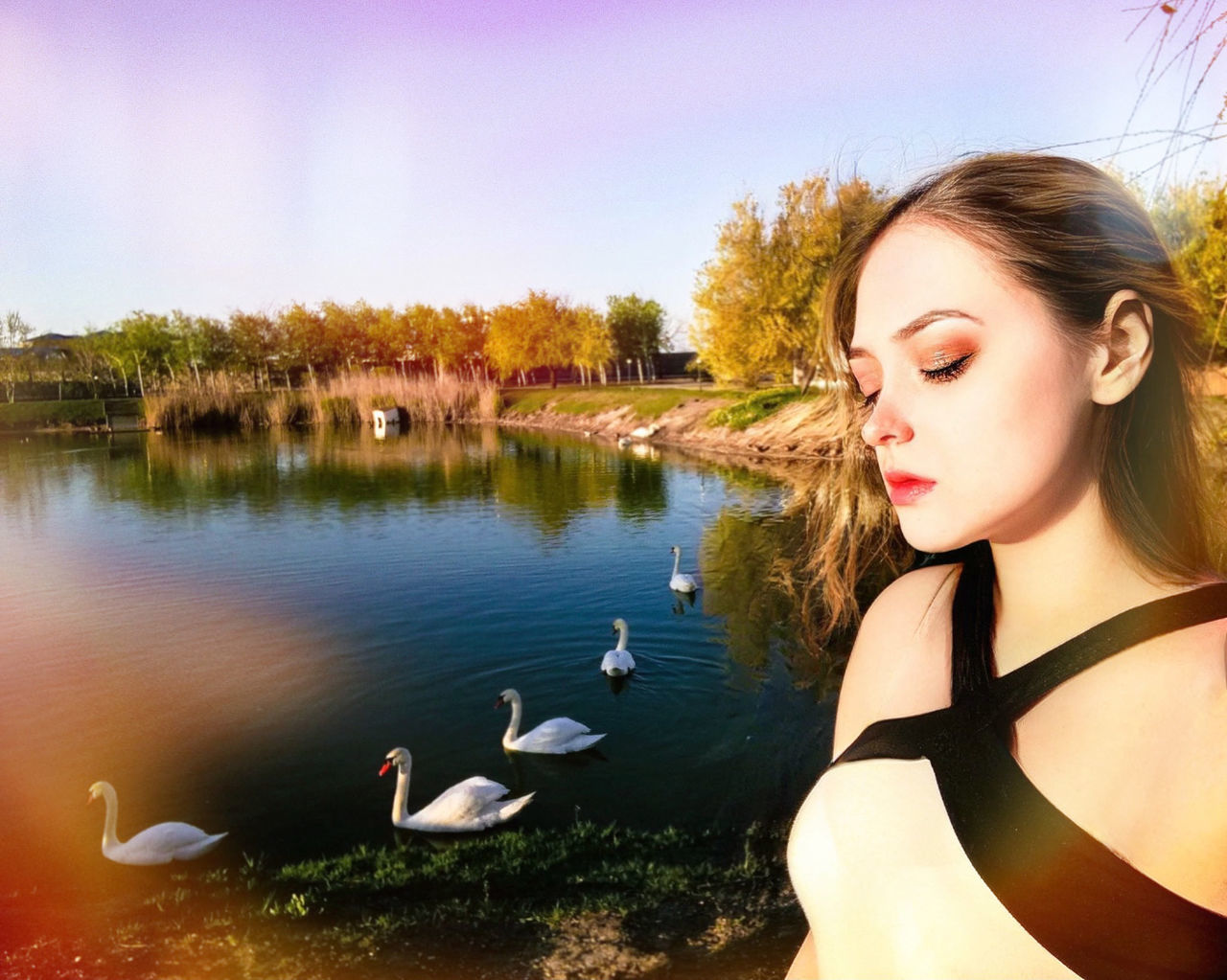 water, bird, animal, women, animal themes, young adult, one person, adult, animal wildlife, nature, lake, wildlife, hairstyle, duck, long hair, leisure activity, beauty in nature, one animal, sky, portrait, lifestyles, outdoors, tree, tranquility, day, fashion, female, plant, reflection, swimming, brown hair, looking, clothing, water bird, side view, person