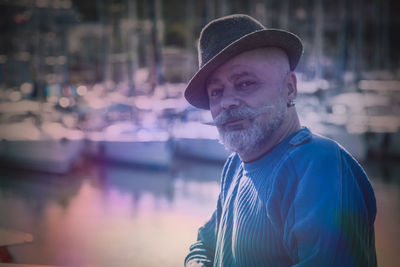 Portrait of smiling man wearing hat