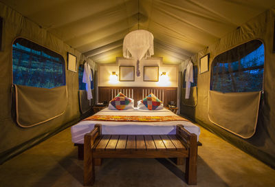 Bedroom inside of a luxury camp on the sri lankan highlands