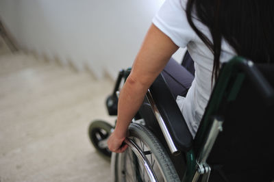 Woman in wheelchair blocked the stairs