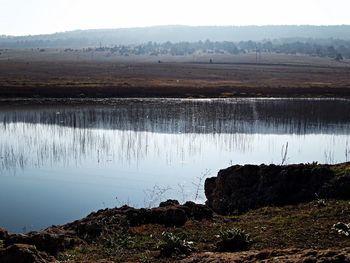 Scenic view of lake against sky