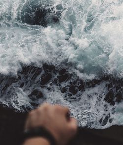 Close-up of waters edge at beach