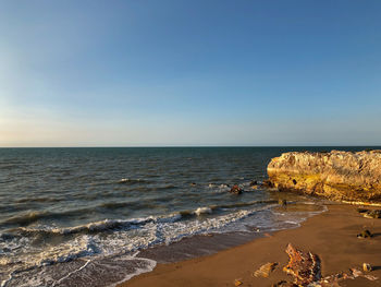 Scenic view of sea against clear sky