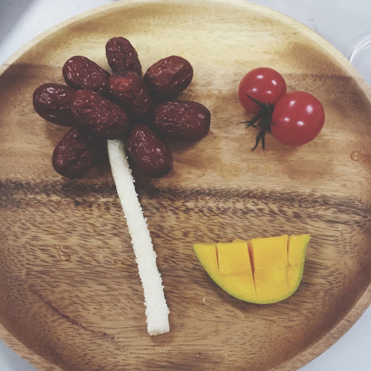 food and drink, food, indoors, freshness, healthy eating, fruit, still life, table, high angle view, plate, red, directly above, close-up, slice, wood - material, ready-to-eat, organic, vegetable, no people, tomato