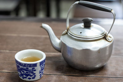 Close-up of tea cup on table