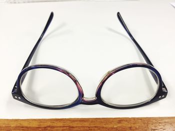 Close-up of eyeglasses on table