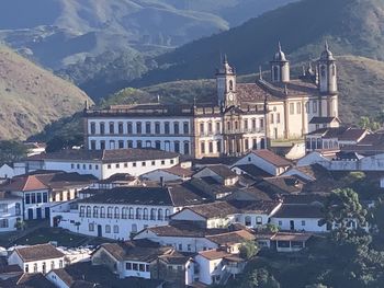 High angle view of townscape and mountains