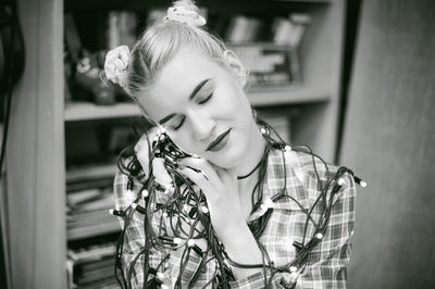 Close-up of young woman smiling