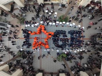 High angle view of people on street in city