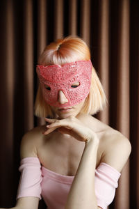 Portrait of woman wearing mask