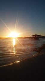 Scenic view of sea at sunset