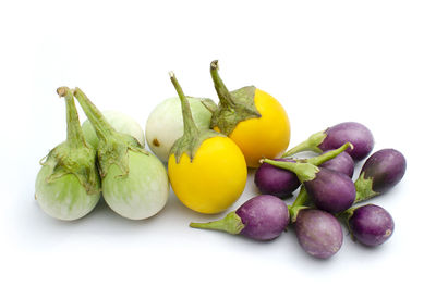 Close-up of fruits against white background