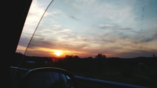 Sunset over road