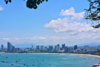 City by sea against sky