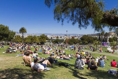 People sitting in a meadow