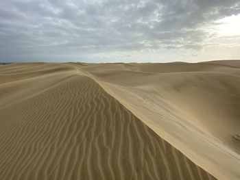 Scenic view of desert against sky