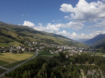 Scenic view of landscape and mountains against sky