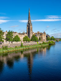 St matthews church reflects in the river tay, perth, scotland