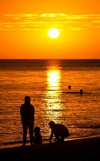 Scenic view of sea at sunset