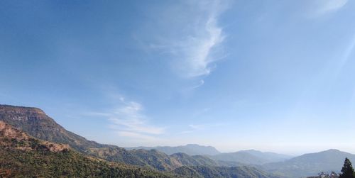 View of mountains against cloudy sky